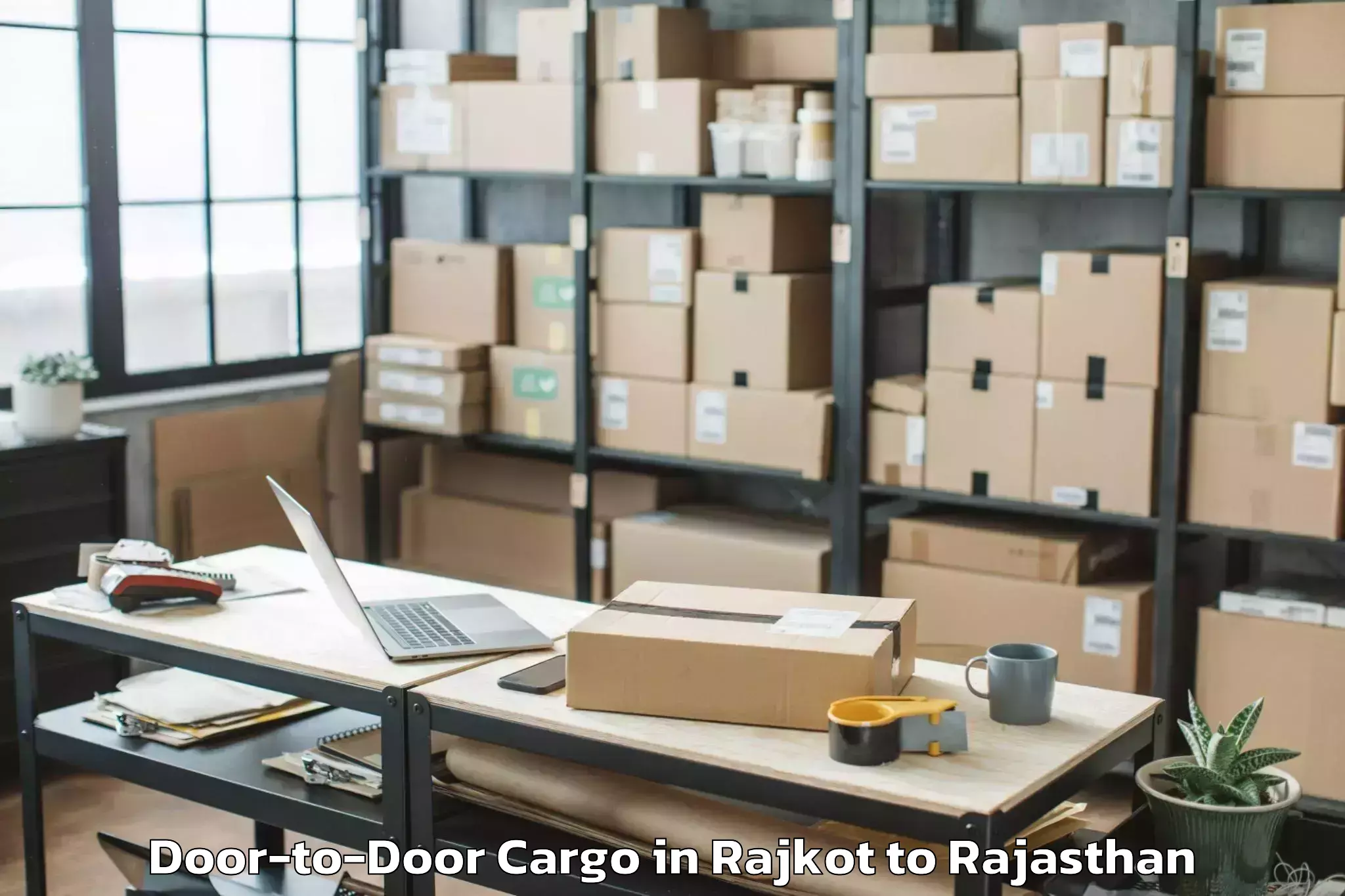 Book Rajkot to Jk Lakshmipat University Jaipu Door To Door Cargo Online